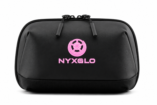 A black zippered nylon bag with a pink circular logo and the brand name 'NYXGLO' printed on the front, set against a plain white background.
