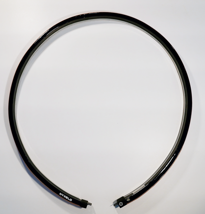 Black circular object  motorcycle wheel light with 'Nyxglo' branding on a white background